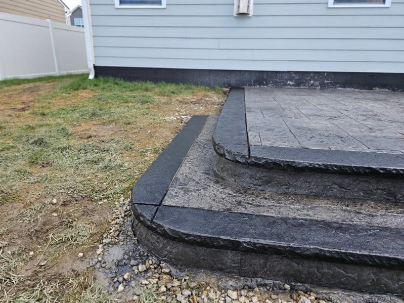 Bullnose stamped step with a wrapped corner by General Maintenance Works